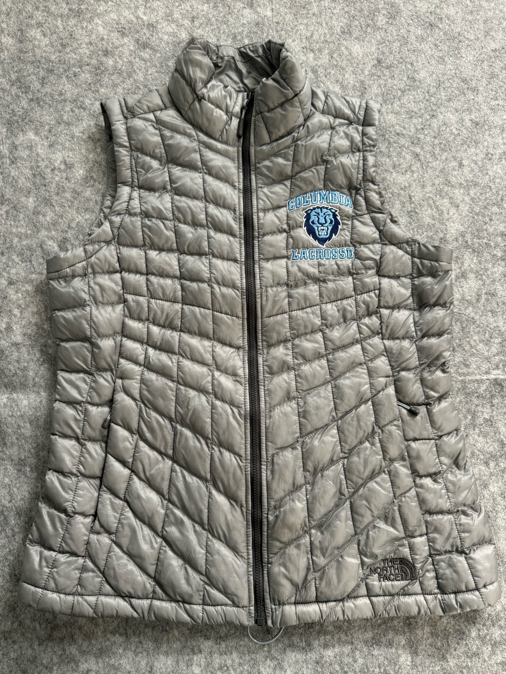 North Face Silver Quilted Puffer Vest with Columbia Lacrosse Embroidered Logo